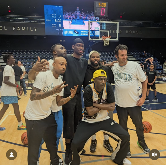 Coach Jeff and the No Flukes team on court