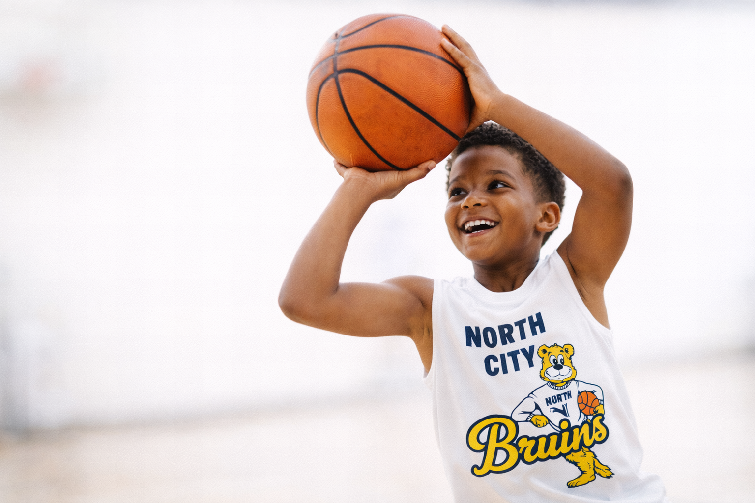 Girl catching basketball ready to pass