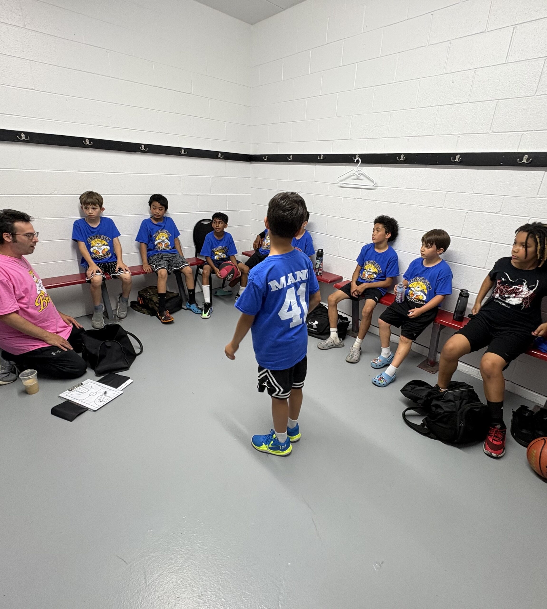 North City Bruins players listening during a team talk